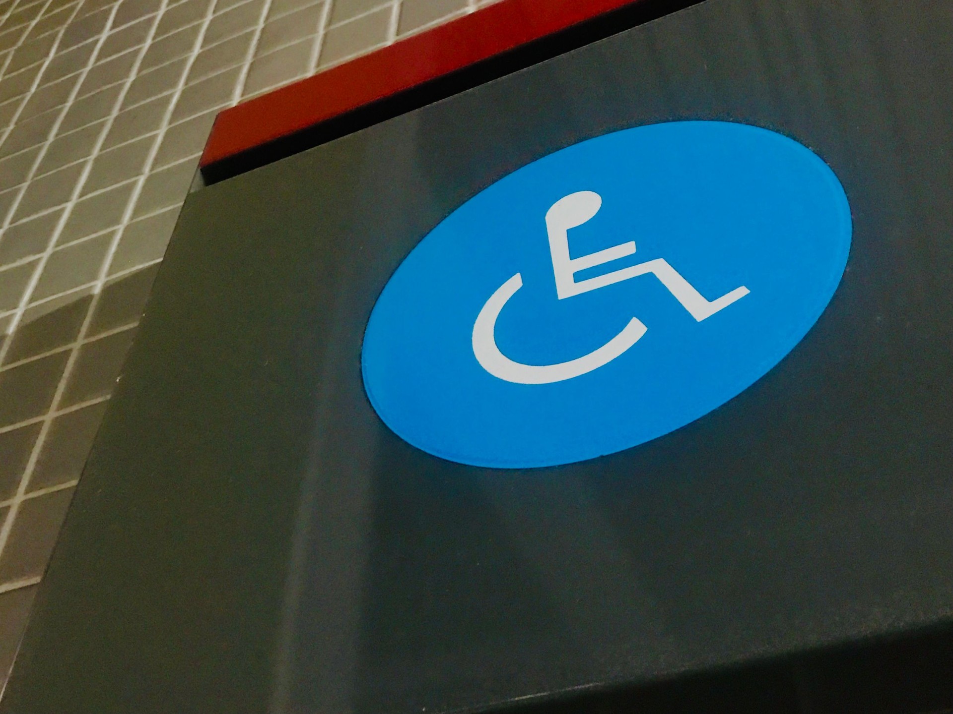 Street signage. Signage on the floor. Signage at the subway station. Visual communication. Urban mobility. Accessibility. Icon symbol of wheelchair